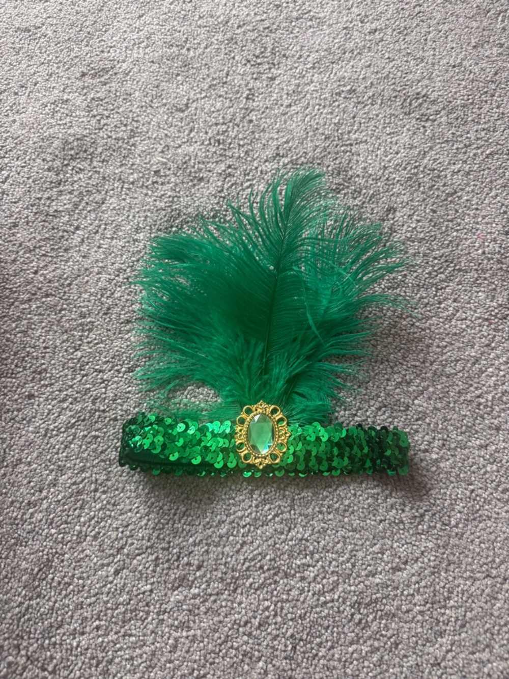 Green feather head piece